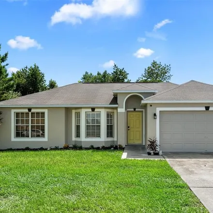 Buy this 4 bed house on 6102 Deltona Boulevard in Spring Hill, FL 34606