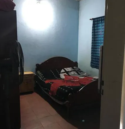 Buy this 4 bed house on Colegio Señora De La Salud in Tuyutí, Partido de Ezeiza