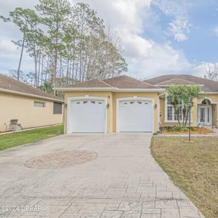 Buy this 3 bed house on 99 Edgely Place in Palm Coast, FL 32164