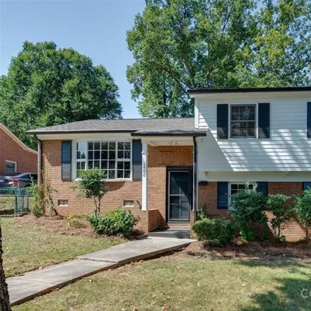 Rent this 4 bed house on 1013 Northwood Drive in Charlotte, NC 28216
