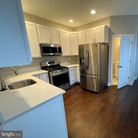 Rent this 4 bed house on 156 North Kenwood Avenue in Baltimore, MD 21224