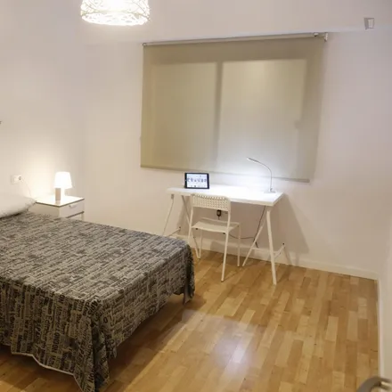 Rent this 4 bed room on Carrer Sant Roc in 46113 Moncada, Spain