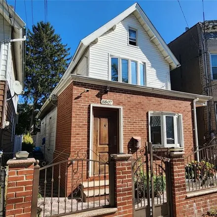 Buy this 3 bed house on 88-07 74th Place in New York, NY 11421