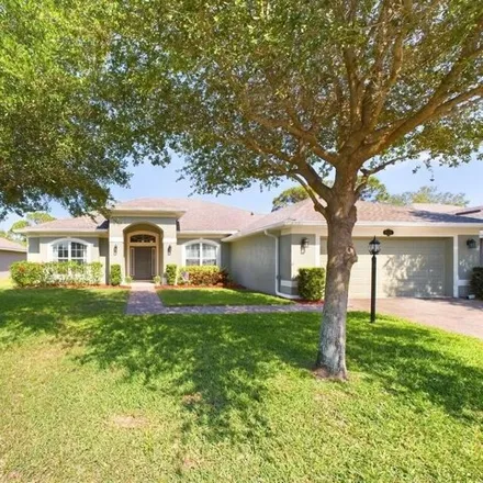 Buy this 4 bed house on 2201 Botanica Circle in West Melbourne, FL 32904