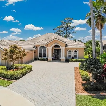 Buy this 4 bed house on 899 Southwest Lake Charles Circle in Port Saint Lucie, FL 34986