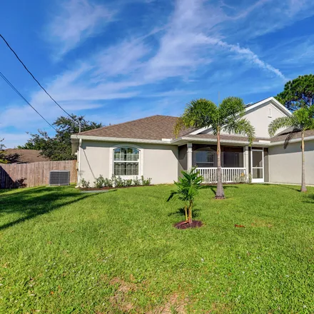 Buy this 4 bed house on 4212 Southwest Winslow Street in Port Saint Lucie, FL 34953