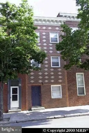 Rent this 4 bed townhouse on 2012 West Fayette Street in Baltimore, MD 21223