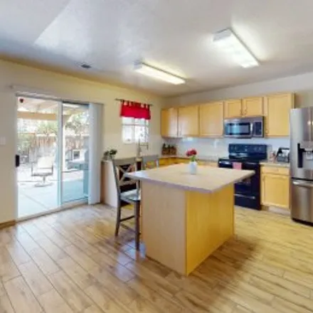 Buy this 4 bed apartment on 5309 River Ridge Avenue Northwest in Stonebridge Pointe, Albuquerque