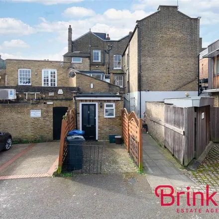 Rent this 2 bed townhouse on Lancaster Place in London, SW19 5DP