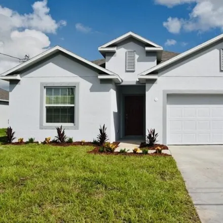 Buy this 4 bed house on 6125 Northwest Drophy Avenue in Port Saint Lucie, FL 34986