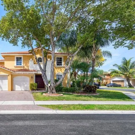 Buy this 5 bed house on 6518 Traveler Road in West Palm Beach, FL 33411