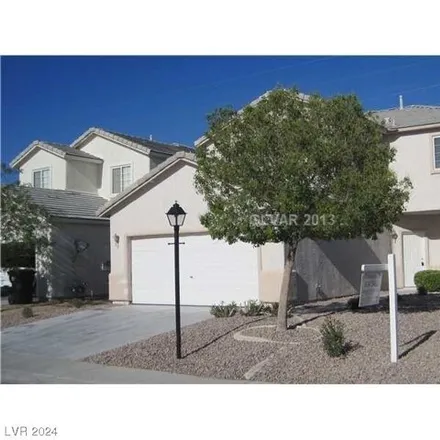 Rent this 4 bed house on 7698 Catalina Harbor Street in Las Vegas, NV 89131