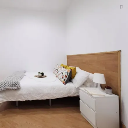 Rent this 4 bed room on Madrid in Calle de Bailén, 39