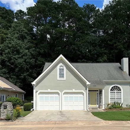 Buy this 4 bed house on 4603 Village Drive in Dunwoody, GA 30338