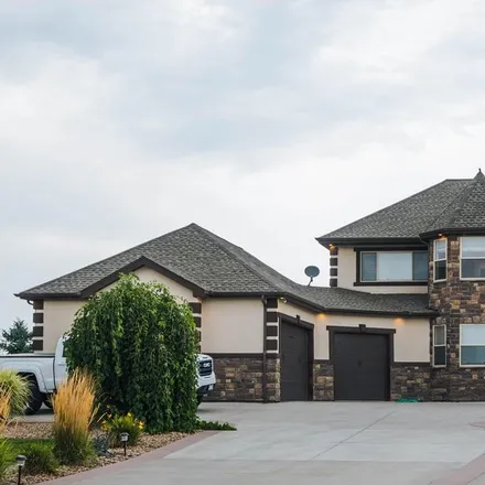 Buy this 6 bed house on Cherry Blossom Drive in Windsor, CO 80550