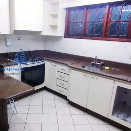 Buy this 4 bed house on Quadra Imobiliaria in Rua Félix Kleis 71, Santa Mônica