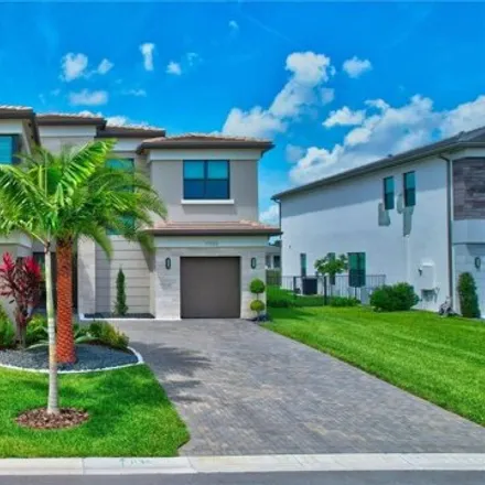 Rent this 5 bed house on Wandering Wave Avenue in Palm Beach County, FL 33496
