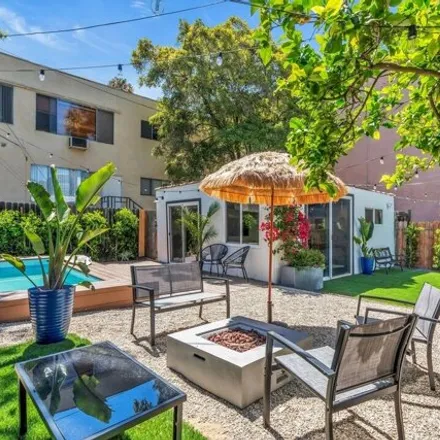 Rent this 4 bed house on 1006 N Crescent Heights Blvd in West Hollywood, California