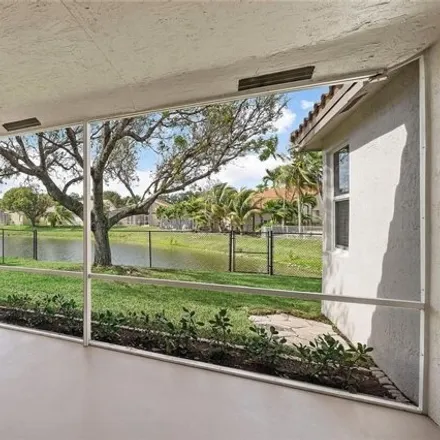 Buy this 4 bed house on 5917 Northwest 73rd Court in Parkland, FL 33067