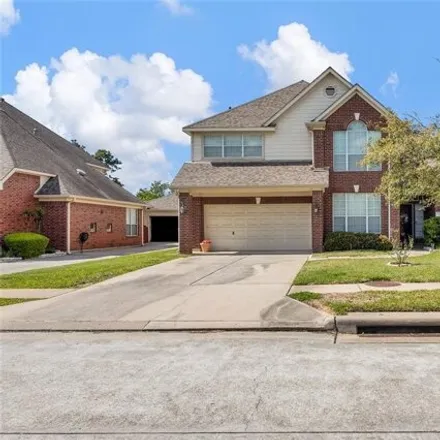 Rent this 4 bed house on 11906 Canyon Timbers Drive in Harris County, TX 77377