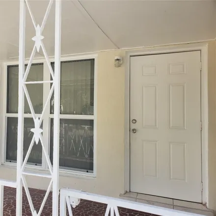 Rent this 4 bed house on 5627 West Hallandale Beach Boulevard in Miami Gardens, West Park