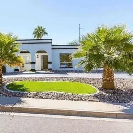 Rent this 3 bed house on 701 East Country Gables Drive in Phoenix, AZ 85022