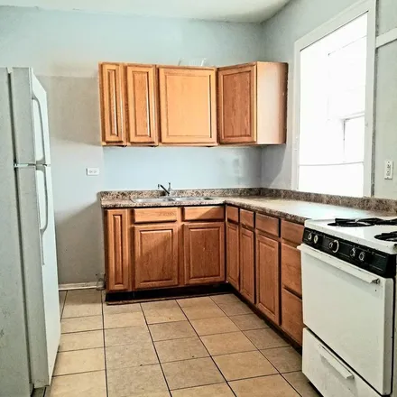 Rent this 2 bed apartment on 8414 South Green Street in Chicago, IL 60620
