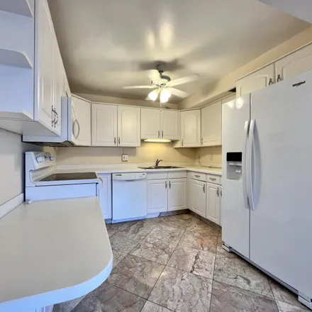 Buy this 2 bed condo on Farnham Street in Century Village, Palm Beach County