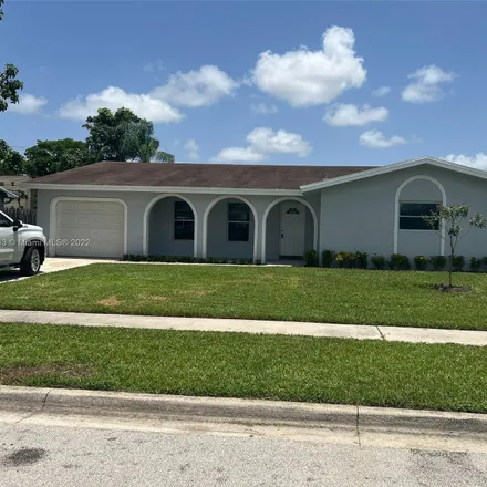 Rent this 4 bed house on 810 Northwest 79th Avenue in Margate, FL 33063