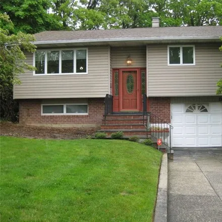 Rent this 3 bed house on 18 Greenwich Road in Smithtown, NY 11787