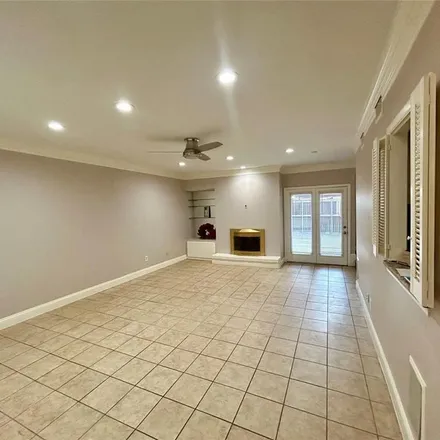 Rent this 4 bed townhouse on 9277 Flickering Shadow Drive in Dallas, TX 75243