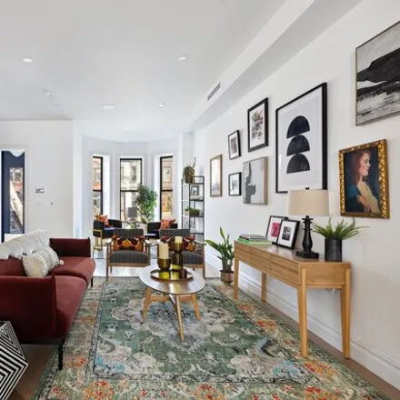 Buy this 5 bed townhouse on 678 Park Place in New York, NY 11216