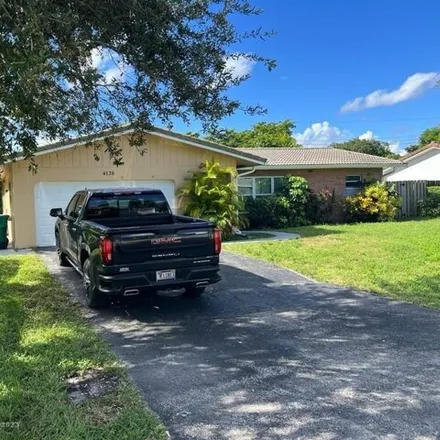 Rent this 4 bed house on 4164 Northwest 79th Avenue in Coral Springs, FL 33065