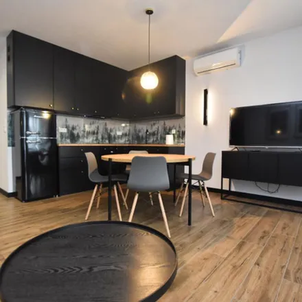 Rent this 3 bed apartment on Kawiory 26 in 30-055 Krakow, Poland