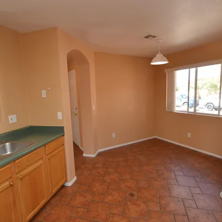 Rent this 3 bed apartment on 2149 West Burlwood Way in Tucson, AZ 85745