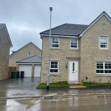 Rent this 4 bed house on Westminster Drive in Bradford, BD14 6SL