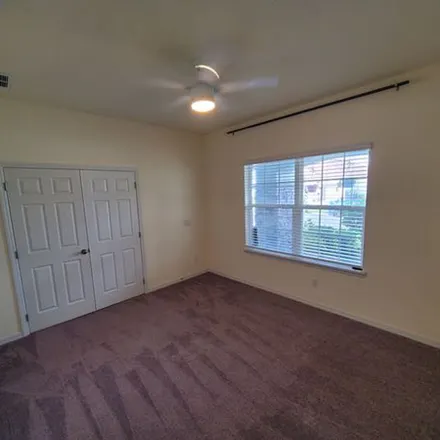 Rent this 4 bed apartment on 11979 Sapwood Street in Orange County, FL 32824