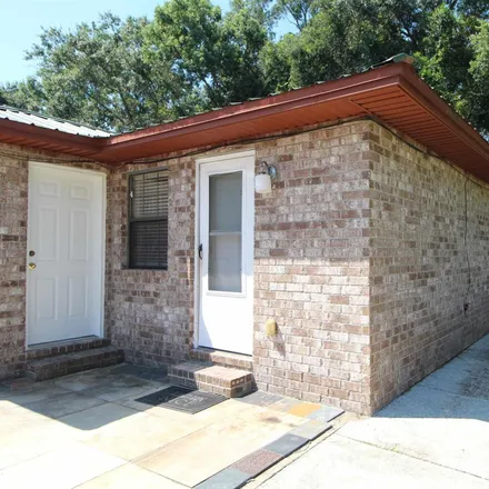 Rent this 2 bed townhouse on Dollar General in 100 East Nine Mile Road, Pensacola