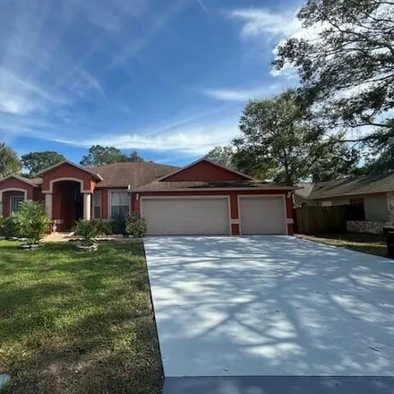Rent this 4 bed house on 769 Aachen Avenue Northwest in Palm Bay, FL 32907