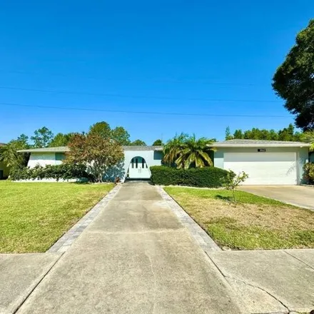 Rent this 3 bed house on 1862 Del Robles Drive in Largo, FL 33771