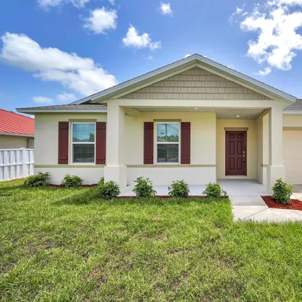 Buy this 4 bed house on 5952 Northwest Brenda Circle in Port Saint Lucie, FL 34986