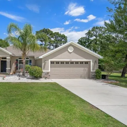 Buy this 4 bed house on 12659 Wind Chime Court in Spring Hill, FL 34609