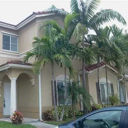Rent this 4 bed townhouse on 10776 Northwest 83rd Terrace in Doral, FL 33178