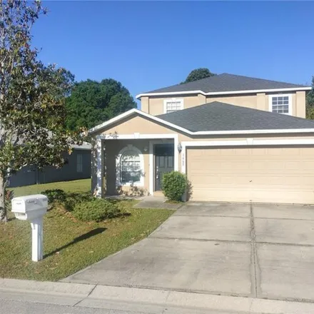 Rent this 4 bed house on 1477 Country Chase Drive in Polk County, FL 33810