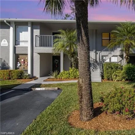 Rent this 2 bed condo on 1208 Commonwealth Circle in Collier County, FL 34116