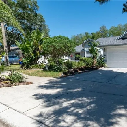 Buy this 3 bed house on 1701 Polo Club Drive in Pinellas County, FL 34689