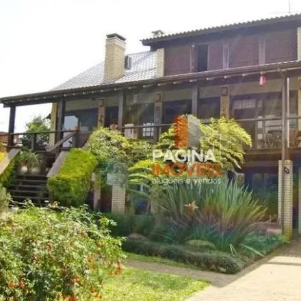 Rent this 5 bed house on Rua das Margaridas in Barro Vermelho, Gravataí - RS