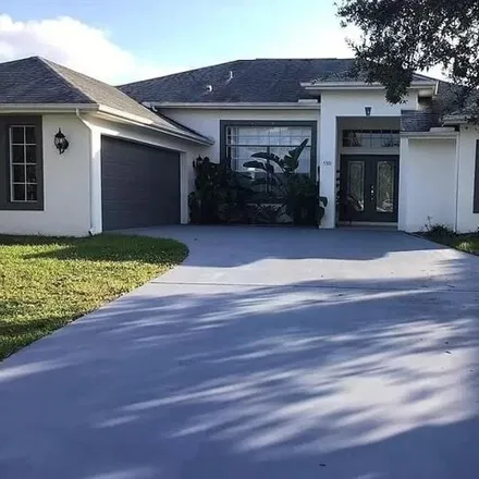 Rent this 4 bed house on 6565 Northwest Omega Road in Port Saint Lucie, FL 34983