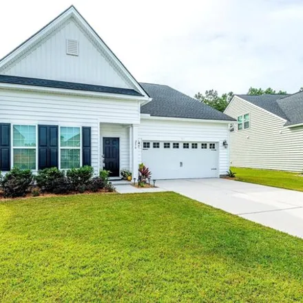 Rent this 4 bed house on 256 Witch Hazel Street in Cane Bay Plantation, SC 29486