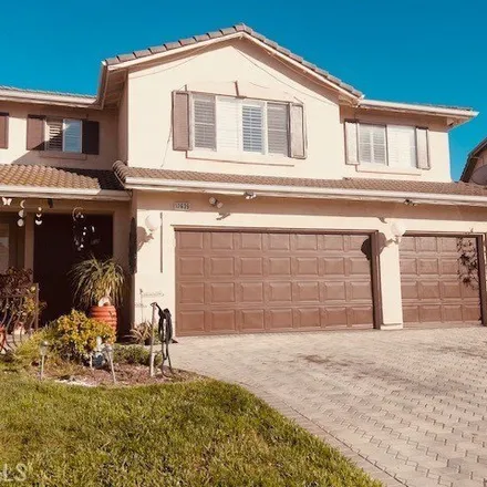 Buy this 5 bed house on 12639 Thoroughbred Court in Corona, CA 92880